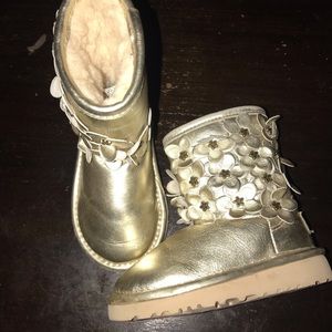 Toddler size 7 uggs. Gold leather with flowers.
